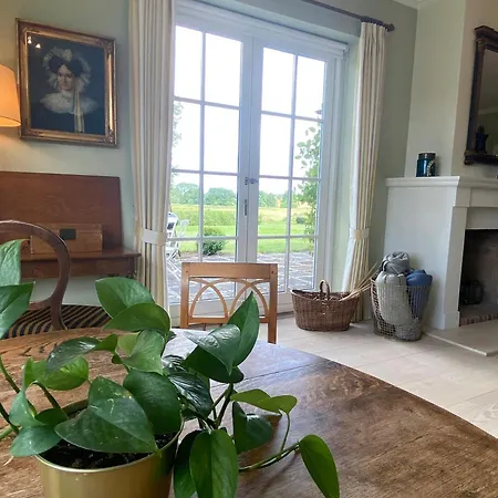 Manor House Overlooking Fields And Garden