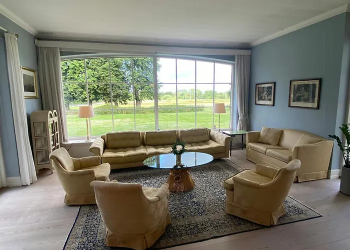 Manor House Overlooking Fields And Garden